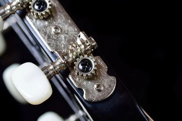 Tuning machine head and peg of an acoustic guitar — Stock Photo, Image