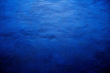 Mavi renkli soyut duvar arkaplanı, mavinin farklı tonlarında.