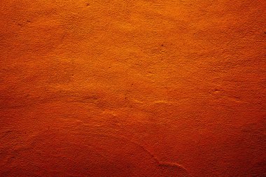 Turuncu renkli soyut duvar arkaplanı, turuncu ve parlak kırmızı renklerin farklı tonlarına sahip.