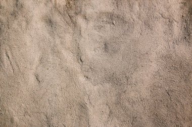 Krem veya bej rengi farklı tonlarda bej renkli duvar dokusu arkaplanı