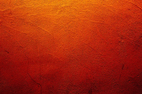 オレンジと明るい赤の異なる色合いのテクスチャとオレンジの抽象的な壁の背景 — ストック写真