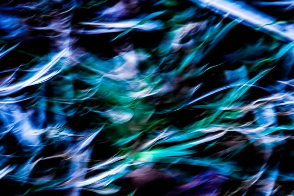 Blue and green abstract blur wave motion background