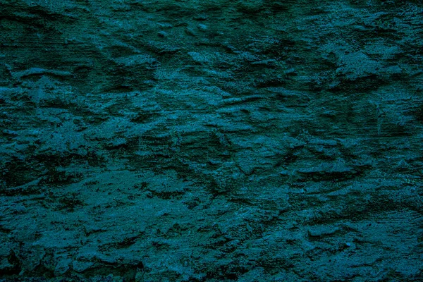 Petrol colored abstract texture background with textures of different shades of petrol also called teal
