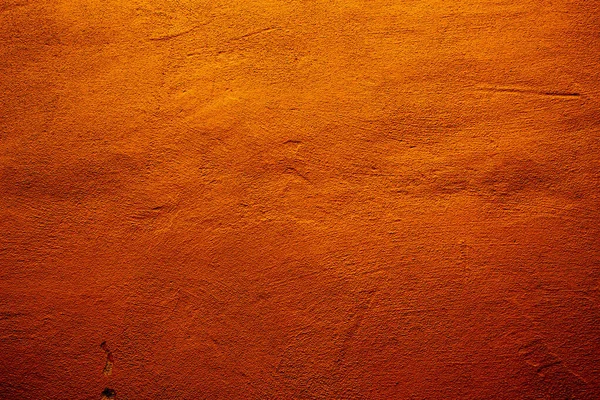 オレンジとオレンジの異なる色合いのテクスチャとオレンジの抽象的な壁の背景赤 — ストック写真