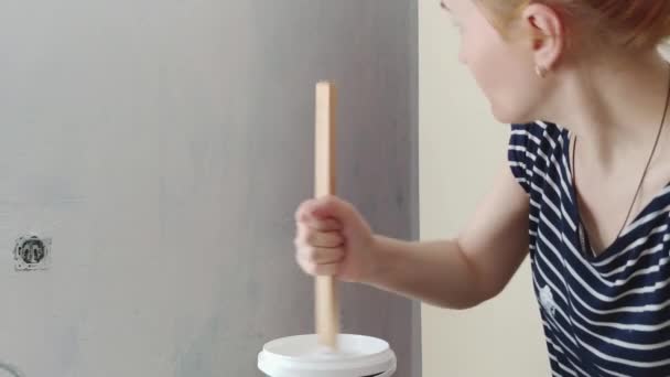 Young White Caucasian Woman Mixing Dense White Paint Wooden Stick — Stock Video