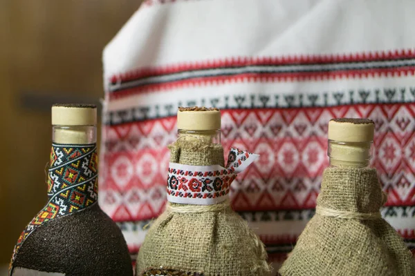 Bottles of traditional Ukrainian alcohol drink vodka - Horilka Лицензионные Стоковые Фото
