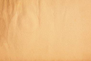 Crumpled old parchment paper texture with round creases