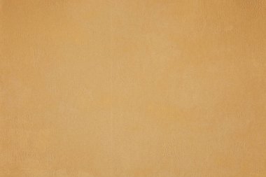 İnce çizgiler ve soyut desenlerle eski, rustik kahverengi kumaş yüzeyi