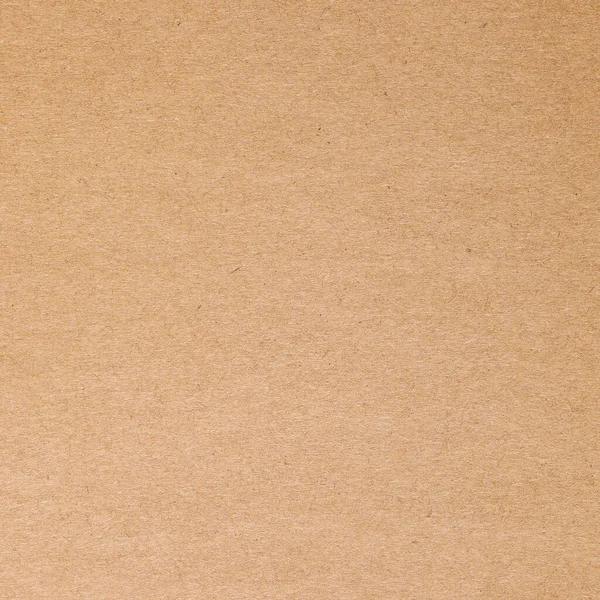Görünür noktalar ve iplikler olan eski Kraft kahverengi kağıt.