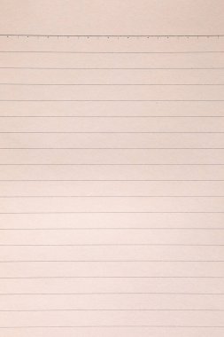 Eski püskü sarı defter kağıdı.