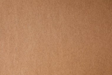 Kraft kahverengi kağıdının lifli makro dokusu benek ve çizik