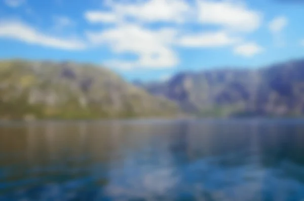 Blurred nature background. Sea and mountains