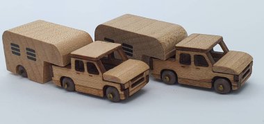 Ahşaptan yapılmış küçük ahşap modellerin yaratıcı çekimlerini kapat, diğer adıyla Simgeler.