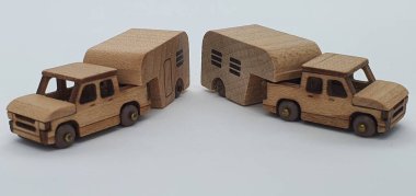 Ahşaptan yapılmış küçük ahşap modellerin yaratıcı çekimlerini kapat, diğer adıyla Simgeler.