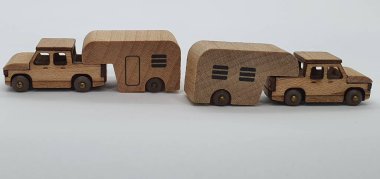 Ahşaptan yapılmış küçük ahşap modellerin yaratıcı çekimlerini kapat, diğer adıyla Simgeler.