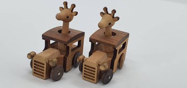 Ahşaptan yapılmış küçük ahşap modellerin yaratıcı çekimlerini kapat, diğer adıyla Simgeler.