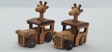 Ahşaptan yapılmış küçük ahşap modellerin yaratıcı çekimlerini kapat, diğer adıyla Simgeler.