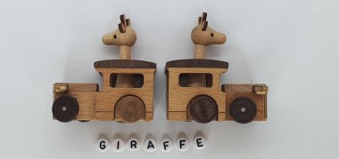 Ahşaptan yapılmış küçük ahşap modellerin yaratıcı çekimlerini kapat, diğer adıyla Simgeler.