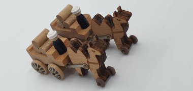 Ahşaptan yapılmış küçük ahşap modellerin yaratıcı çekimlerini kapat, diğer adıyla Simgeler.