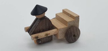 Ahşaptan yapılmış küçük ahşap modellerin yaratıcı çekimlerini kapat, diğer adıyla Simgeler.