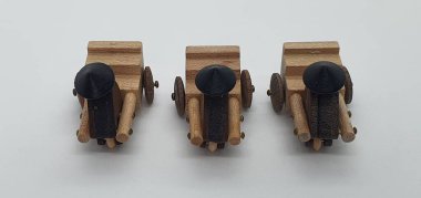 Ahşaptan yapılmış küçük ahşap modellerin yaratıcı çekimlerini kapat, diğer adıyla Simgeler.