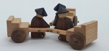 Ahşaptan yapılmış küçük ahşap modellerin yaratıcı çekimlerini kapat, diğer adıyla Simgeler.