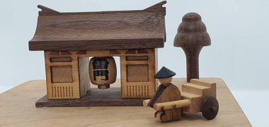 Ahşaptan yapılmış küçük ahşap modellerin yaratıcı çekimlerini kapat, diğer adıyla Simgeler.