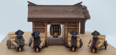 Ahşaptan yapılmış küçük ahşap modellerin yaratıcı çekimlerini kapat, diğer adıyla Simgeler.