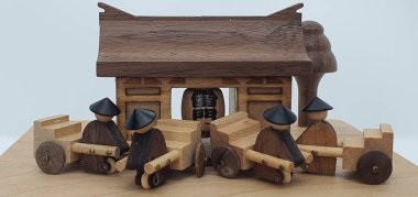 Ahşaptan yapılmış küçük ahşap modellerin yaratıcı çekimlerini kapat, diğer adıyla Simgeler.