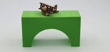 Ahşaptan yapılmış küçük ahşap modellerin yaratıcı çekimlerini kapat, diğer adıyla Simgeler.