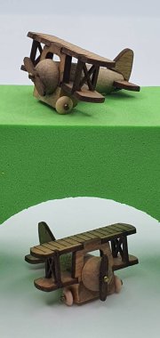 Ahşaptan yapılmış küçük ahşap modellerin yaratıcı çekimlerini kapat, diğer adıyla Simgeler.