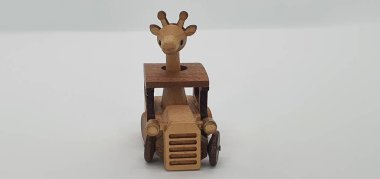 Ahşaptan yapılmış küçük ahşap modellerin yaratıcı çekimlerini kapat, diğer adıyla Simgeler.