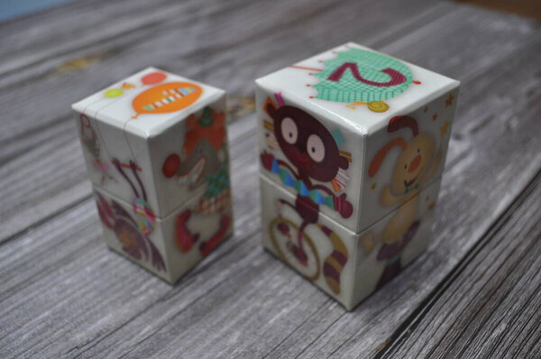 Creative shots of abstract background of cube arts with numbers and cute pictures
