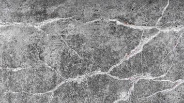 Çatlaklı eski beton duvar. Doku gri. Yakın plan..