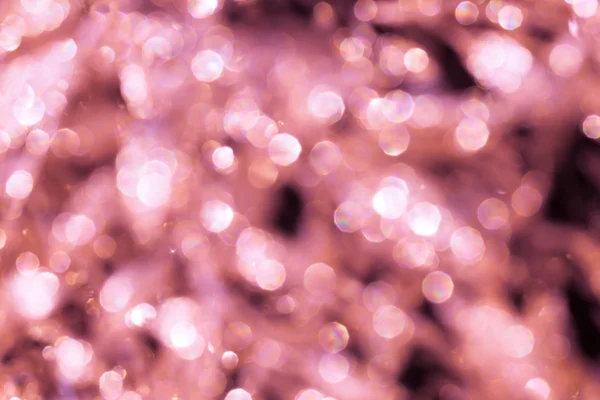 Golden sequins in bokeh - background and festive atmosphere, hol — Stock Photo, Image