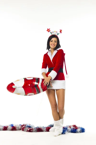 Bella giovane donna vestita da Babbo Natale su un backgrou bianco — Foto Stock