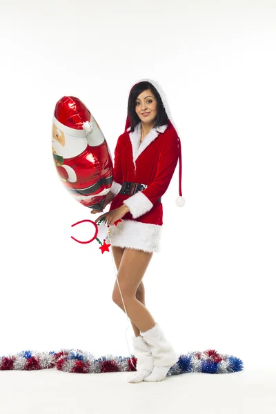 Vacker ung kvinna klädd som jultomte på en vit backgrou — Stockfoto