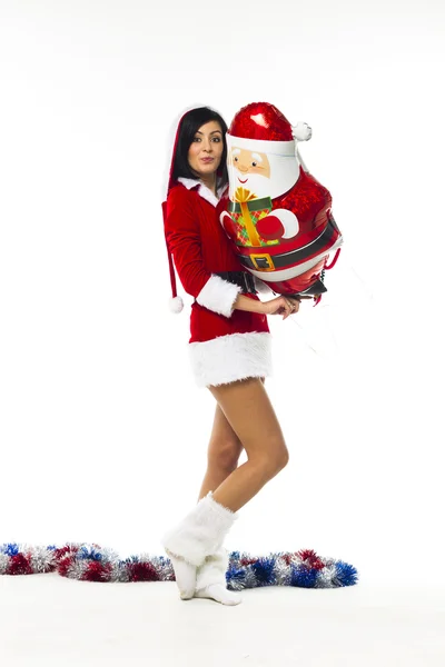 Noel Baba olarak üzerinde beyaz bir backgrou giymiş genç kadın güzel — Stok fotoğraf