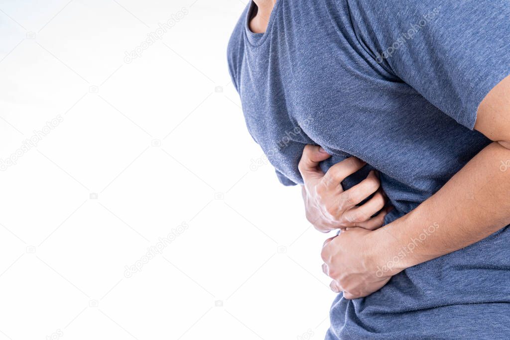 Man suffering from stomach pain and injury isolated white background. Health care and medical concept.