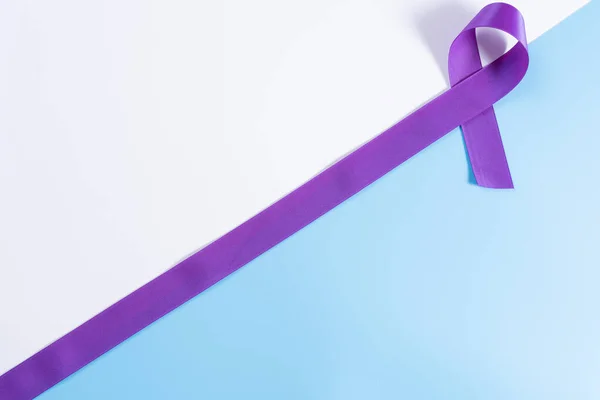 World Cancer Day Purple Ribbon Blue Background Copy Space Text — Stock Photo, Image