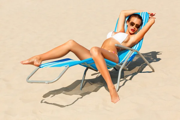 Young woman in white bikini — Stock Photo, Image