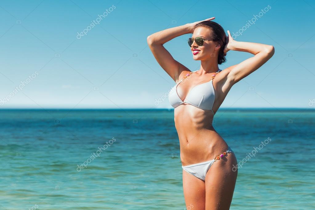 women in white bikini