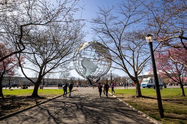 Queens, NY - April 3, 2021: View of the Unisphere, a spherical stainless steel representation of the Earth. Designed by Gilmore D. Clarke for the 1964 New York World's Fair.