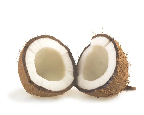 Kokosnöt skuren i halvor — Stockfoto