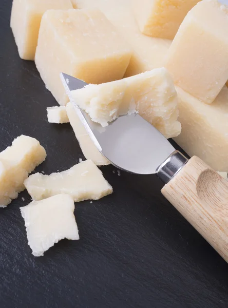 Parmesan cheese and knife — Stock Photo, Image