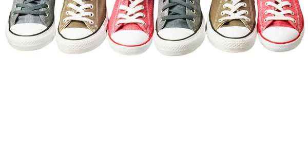 白色背景的色彩艳丽的运动鞋的多样性 — 图库照片