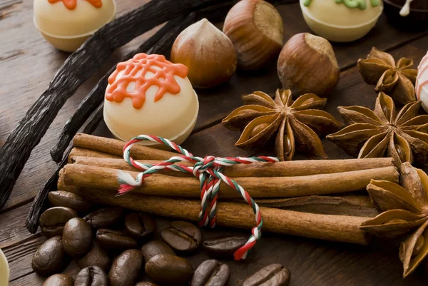 Chocolates and spices — Stock Photo, Image