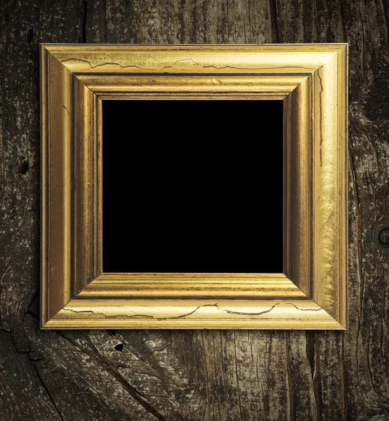 Wooden golden photo frame — Stock Photo, Image