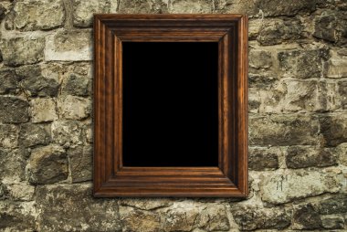 Tuğla duvara asılı çerçeve