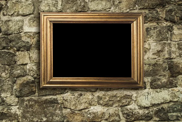 Frame hanging on brick wall — Stock Photo, Image